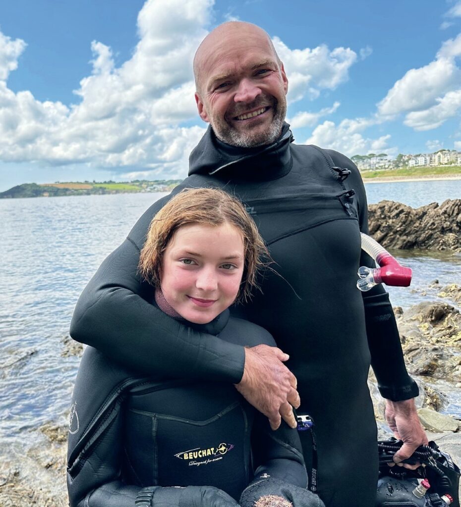 Proud dad with Isla after a snorkel adventure